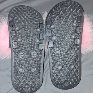 Womans pink furry slides